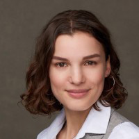 wearing white shirt and hoop earrings